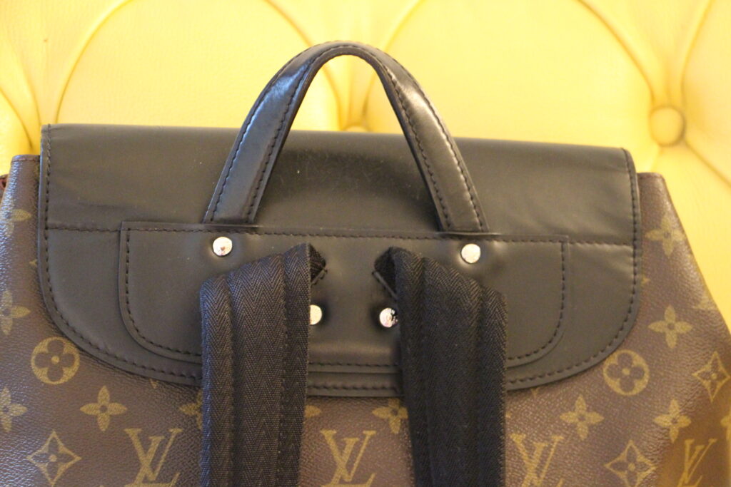 Sac à dos Louis Vuitton en toile monogram et cuir noir