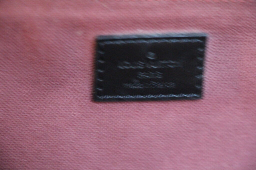 Sac à dos Louis Vuitton en toile monogram et cuir noir