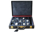 Porte-documents en cuir noir Hermès, Attache-montre Hermès, Coffret montre Hermès