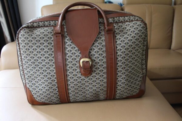 Valise Goyard en toile tissée