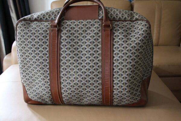 Valise Goyard en toile tissée