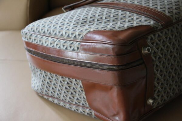 Valise Goyard en toile tissée