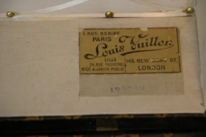 malle Louis Vuitton en toile tissée
