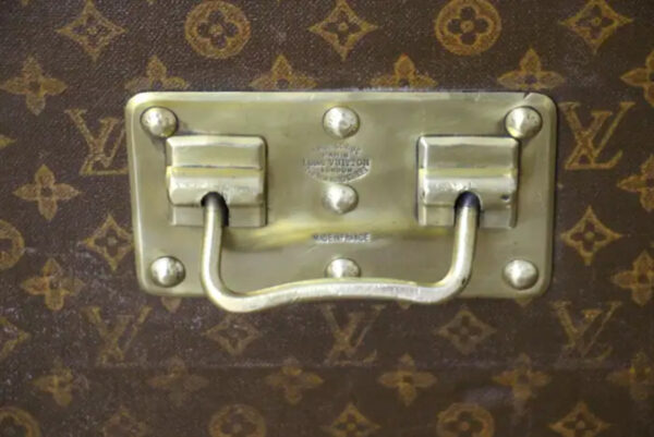 Malle Louis Vuitton ancienne en toile